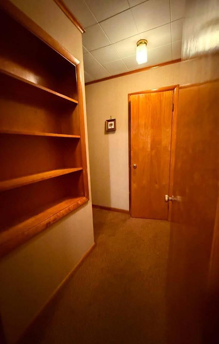 17 Allen Street Catskill, NY 12414 - Photo 23 of 37 a view of an empty room with empty shelves