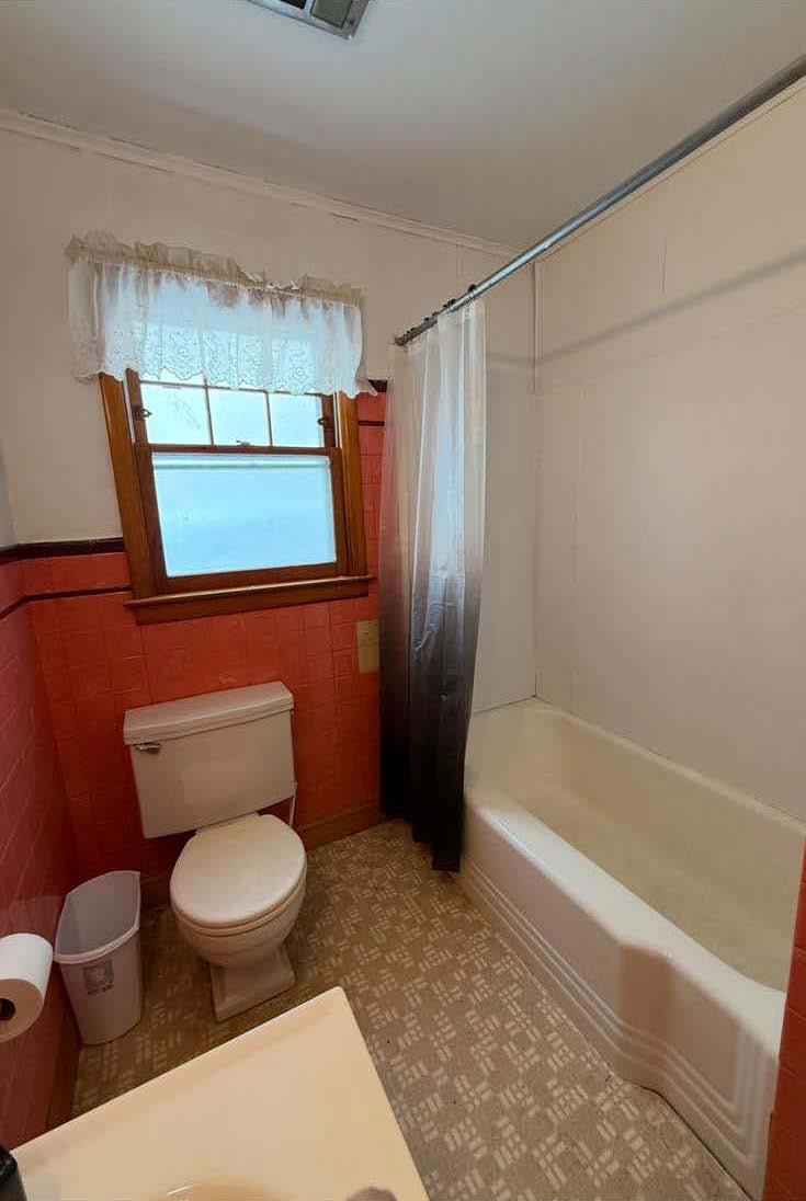17 Allen Street Catskill, NY 12414 - Photo 9 of 37 a bathroom with a toilet and a shower