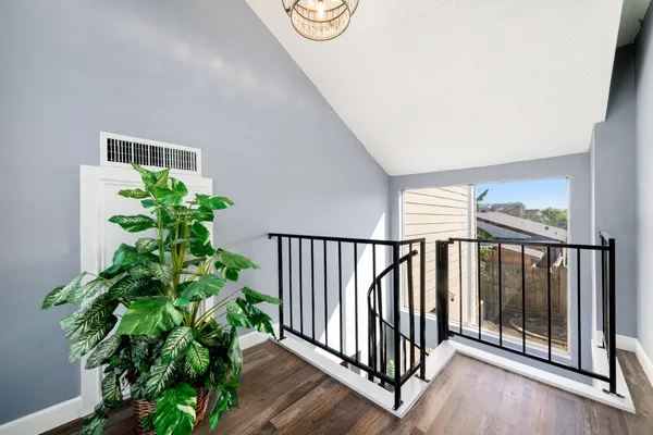 a view of entryway with wooden floor