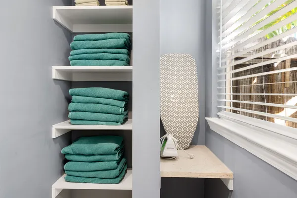 a bathroom with a sink and a window