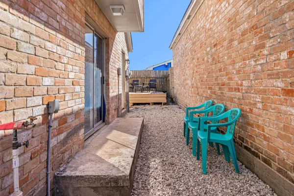 a garden view with a seating space