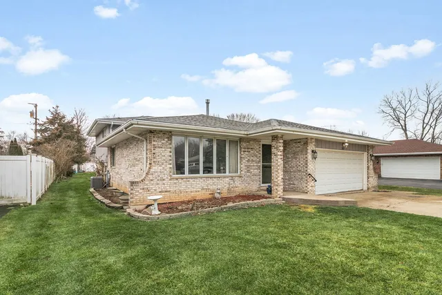 a front view of house with yard