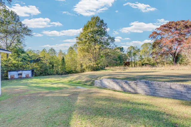 a view of a playground with basketball court