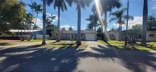a view of a swimming pool with a backyard