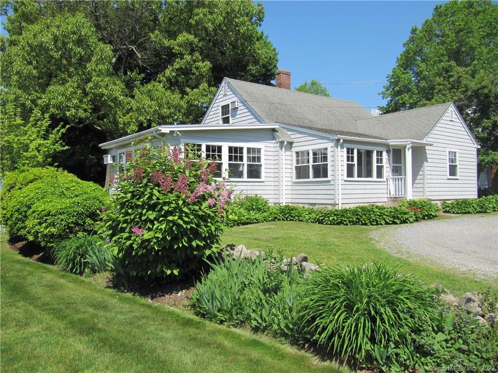 25 Ave A Westbrook, CT 06498 - Photo 1 of 1 front view of a house with a yard
