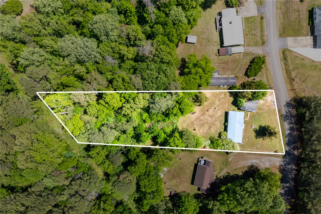 209 Short Cut Road Westminster, SC 29693 - Photo 15 of 27 This expansive lot offers a tranquil retreat with lush greenery and ample space for your vision.