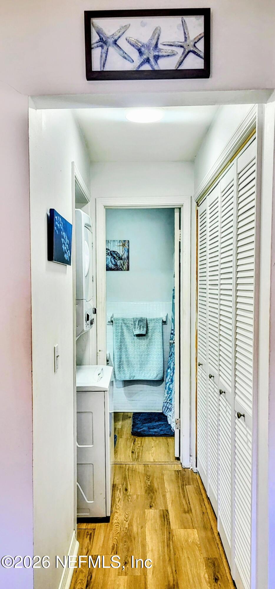 1647 El Camino Road, Unit 5 Jacksonville, FL 32216 - Photo 11 of 36 a bathroom with a tub and shower