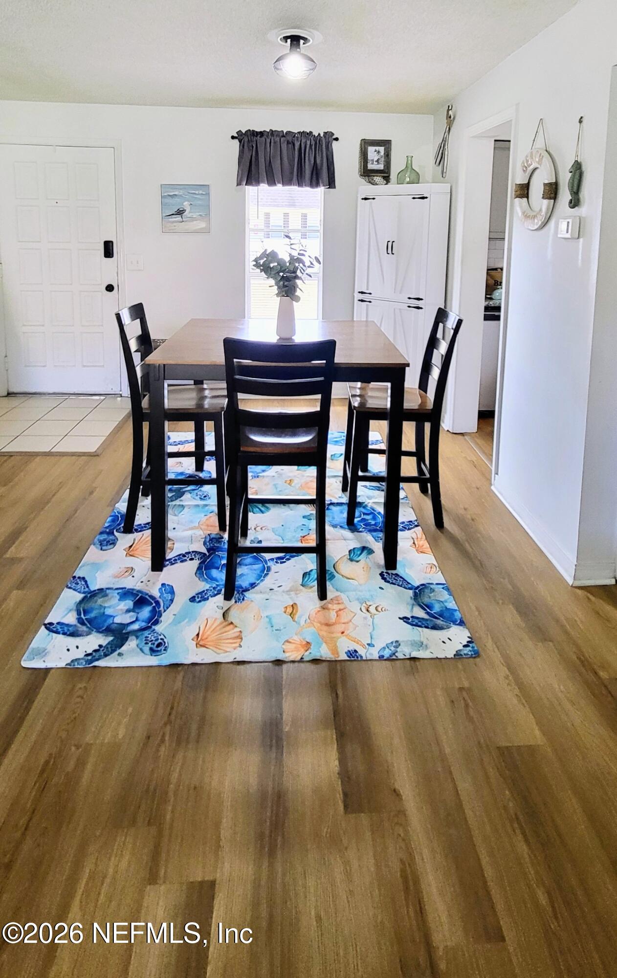 1647 El Camino Road, Unit 5 Jacksonville, FL 32216 - Photo 18 of 36 a view of a dining room with furniture
