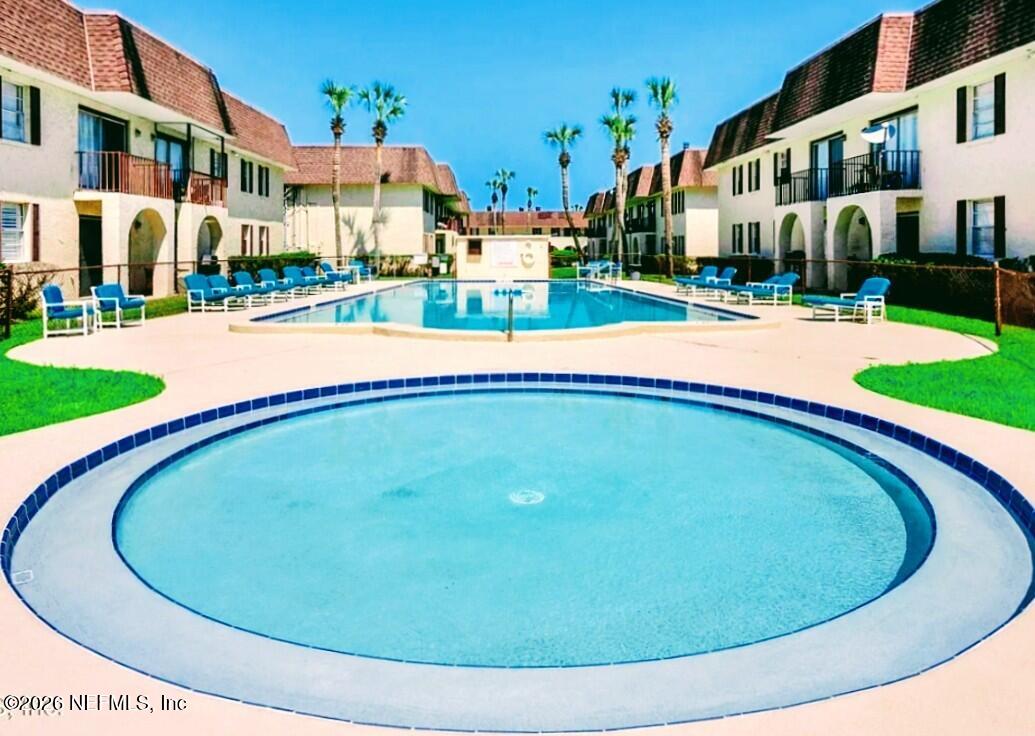1647 El Camino Road, Unit 5 Jacksonville, FL 32216 - Photo 3 of 36 a view of outdoor space yard deck and swimming pool