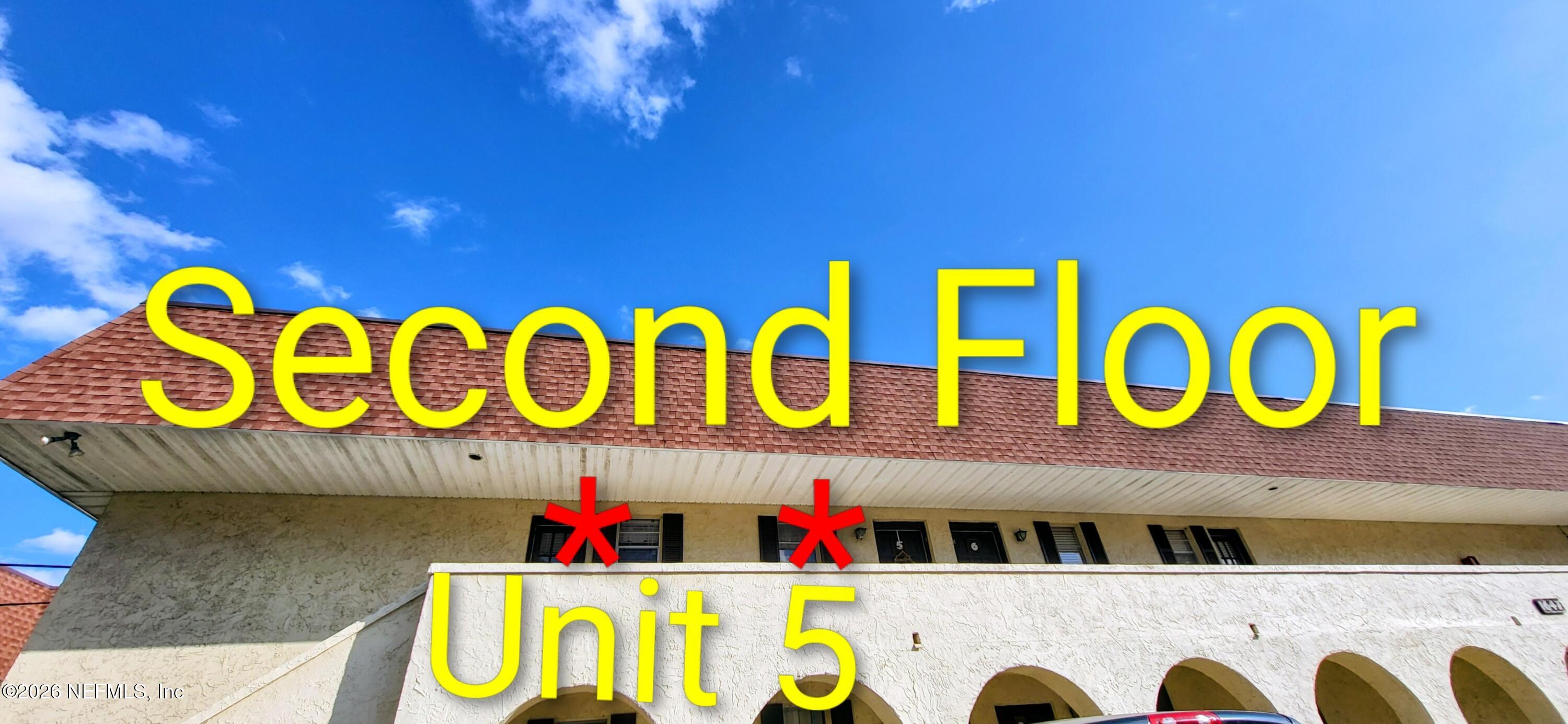 1647 El Camino Road, Unit 5 Jacksonville, FL 32216 - Photo 33 of 36 a sign board with buildings in the background