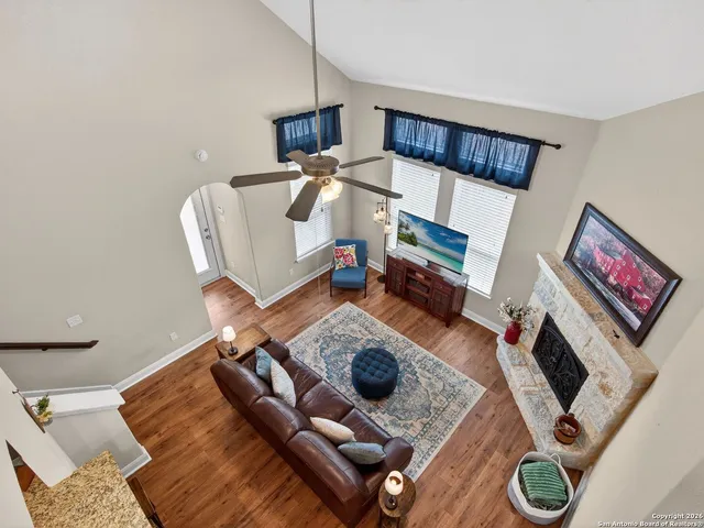 a living room with furniture and a rug