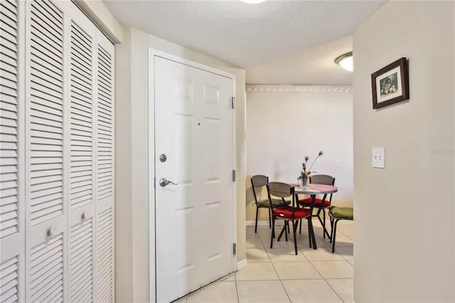 a view of a hallway with furniture