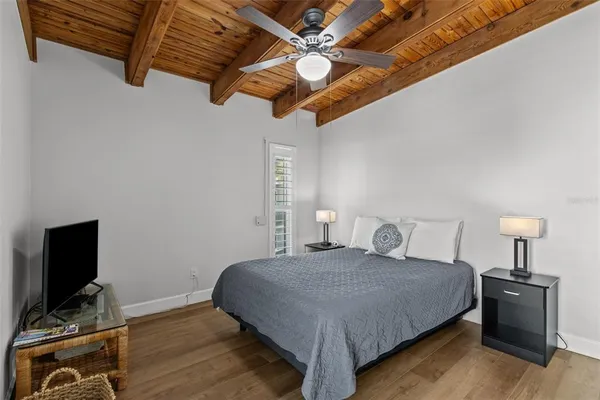 a view of a livingroom with a chandelier fan