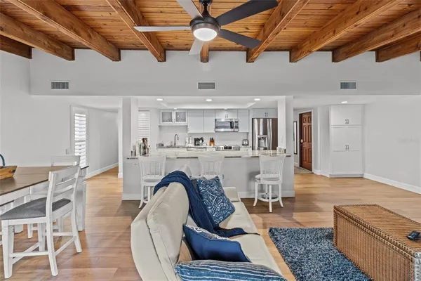 a living room with furniture and a rug