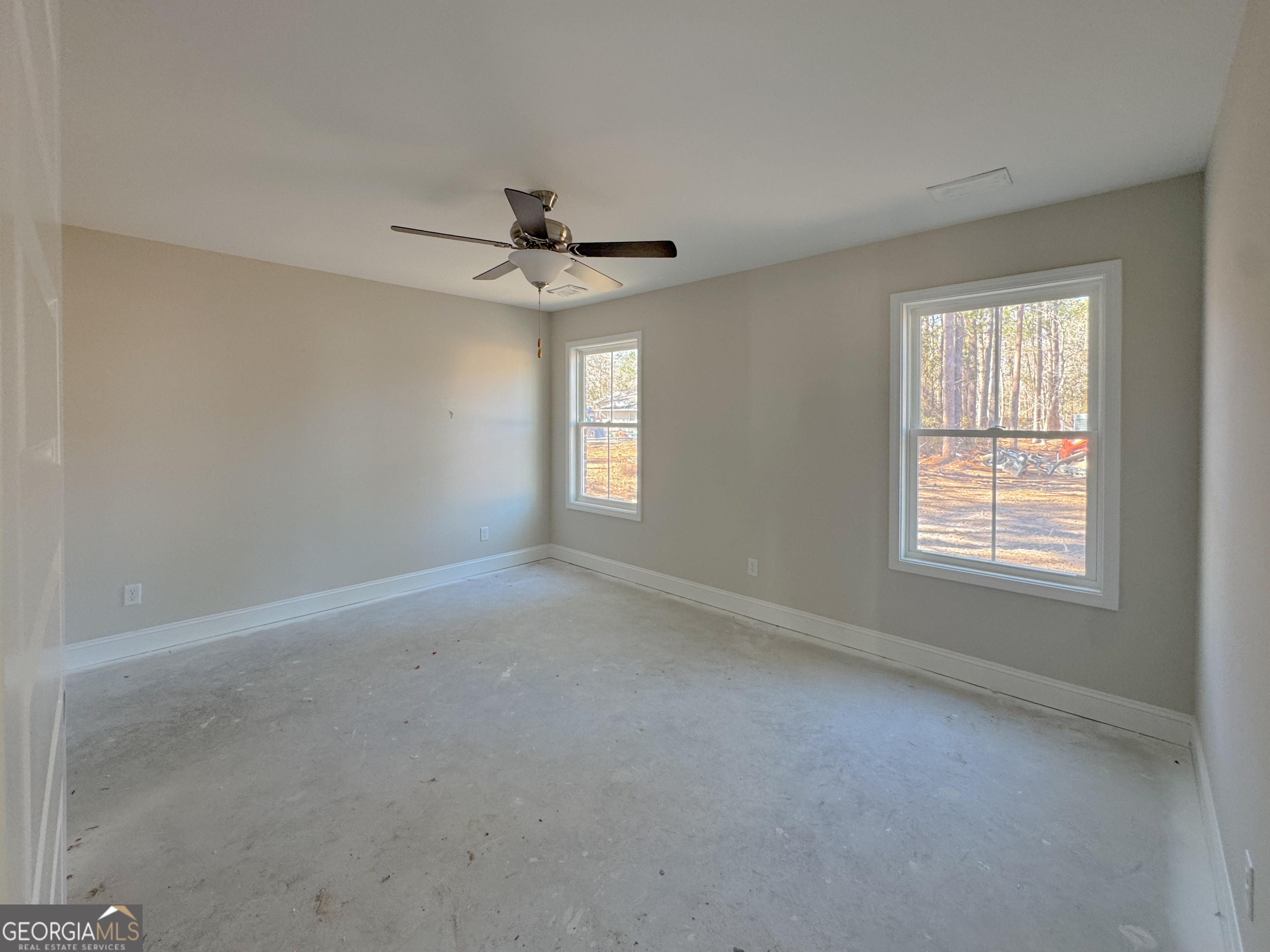 202 Zetterower Road Statesboro, GA 30458 - Photo 16 of 22 a view of an empty room with a window