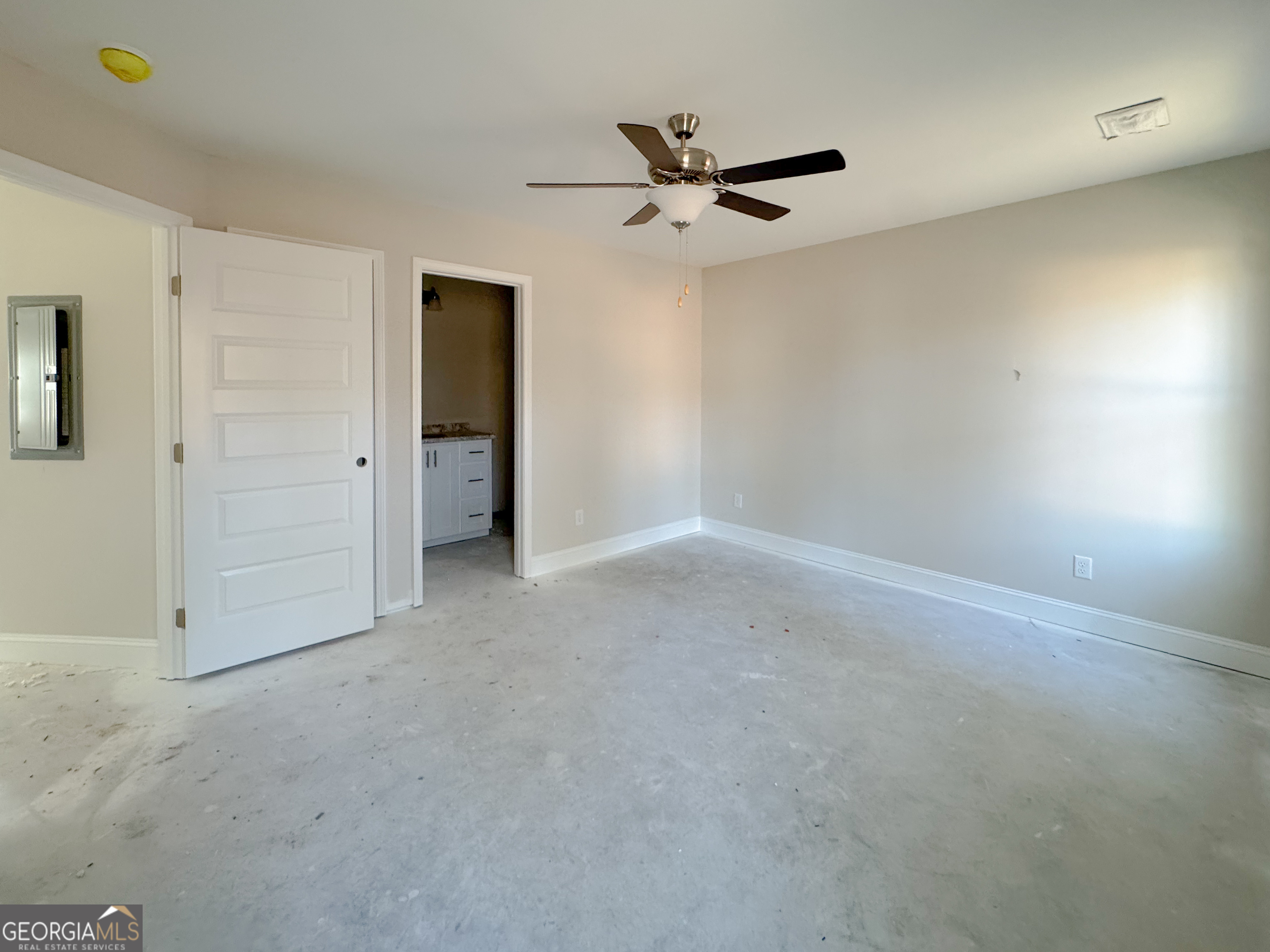 202 Zetterower Road Statesboro, GA 30458 - Photo 17 of 22 a view of a livingroom with a ceiling fan and window