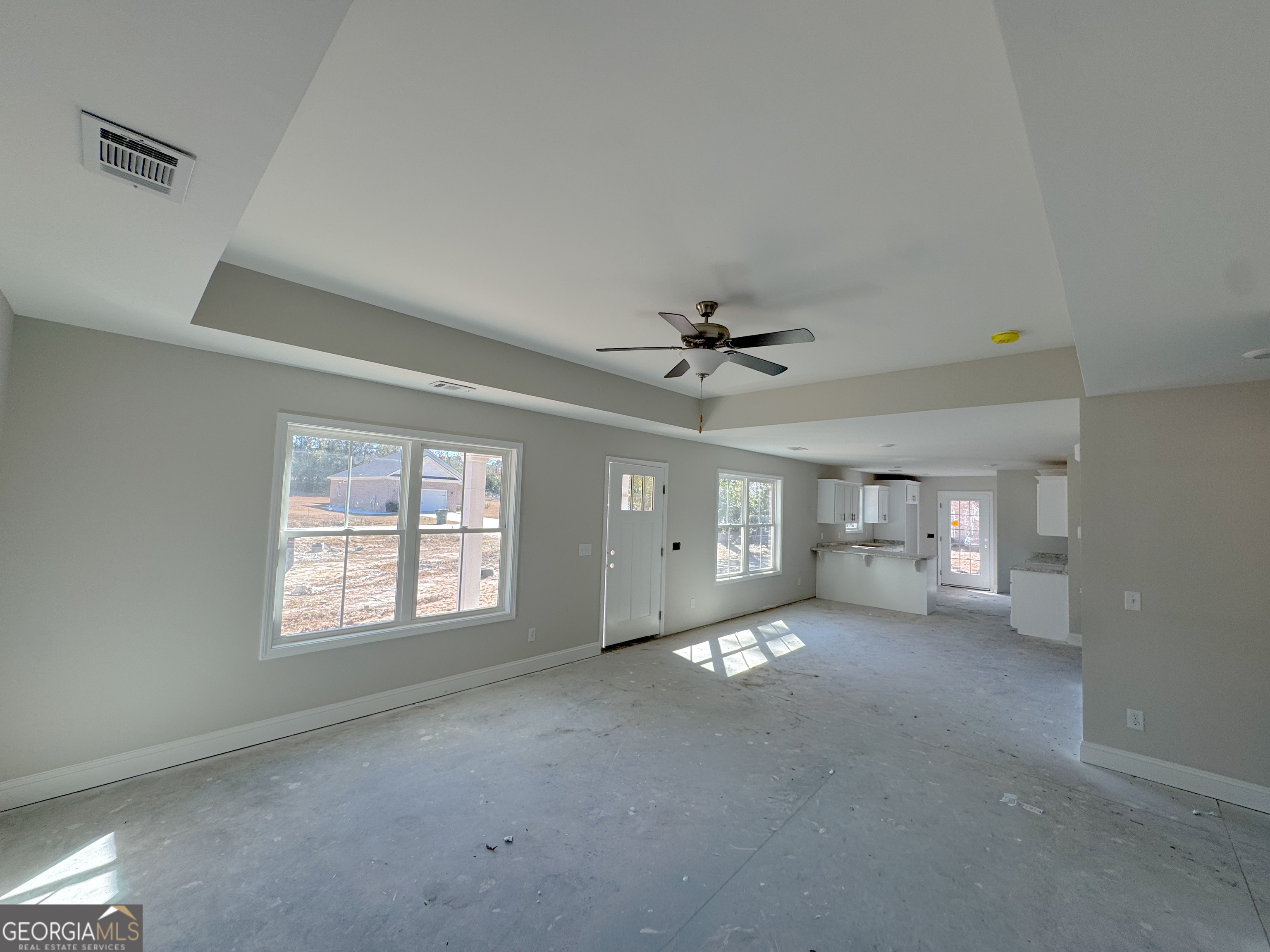 202 Zetterower Road Statesboro, GA 30458 - Photo 5 of 22 a view of an empty room with a window