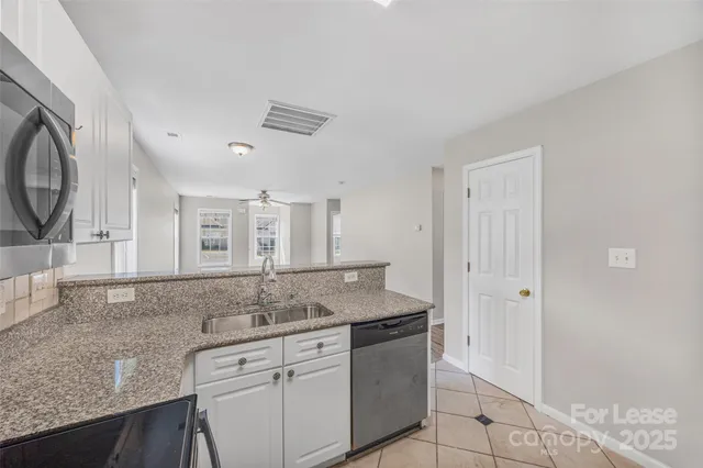 a sink and a granite counter top