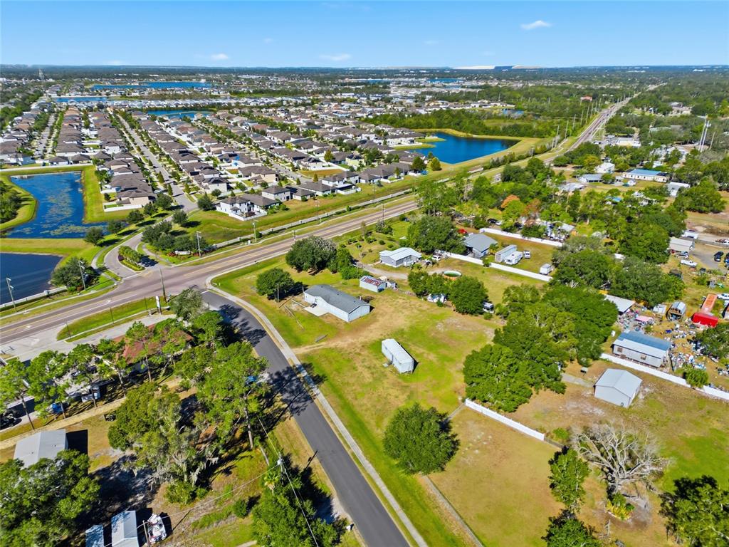 12422 Balm Riverview Road Riverview, FL 33579 - Photo 11 of 13 an aerial view of residential houses with outdoor space