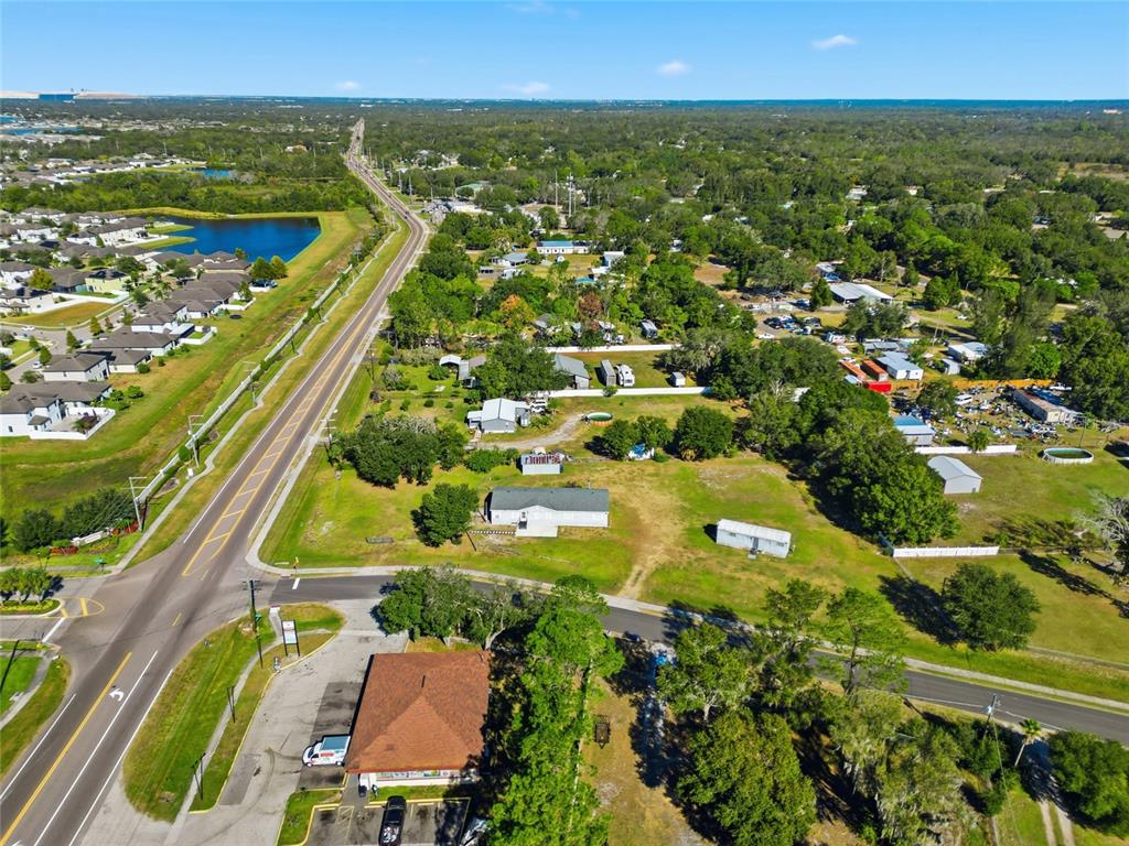 12422 Balm Riverview Road Riverview, FL 33579 - Photo 12 of 13 an aerial view of residential houses with outdoor space