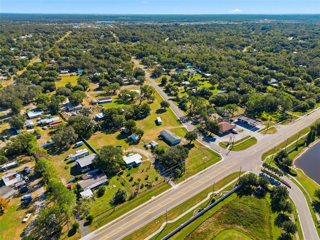 12422 Balm Riverview Road Riverview, FL 33579 - Photo 9 of 13 an aerial view of residential houses with outdoor space