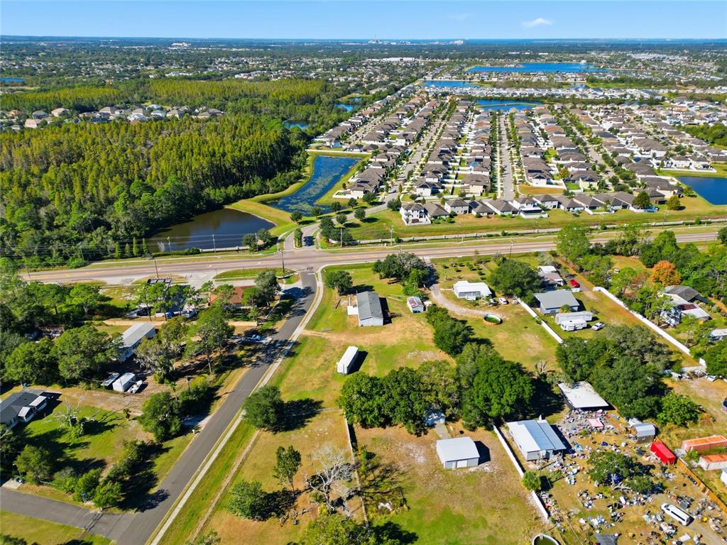 12422 Balm Riverview Road Riverview, FL 33579 - Photo 10 of 13 an aerial view of residential building and lake