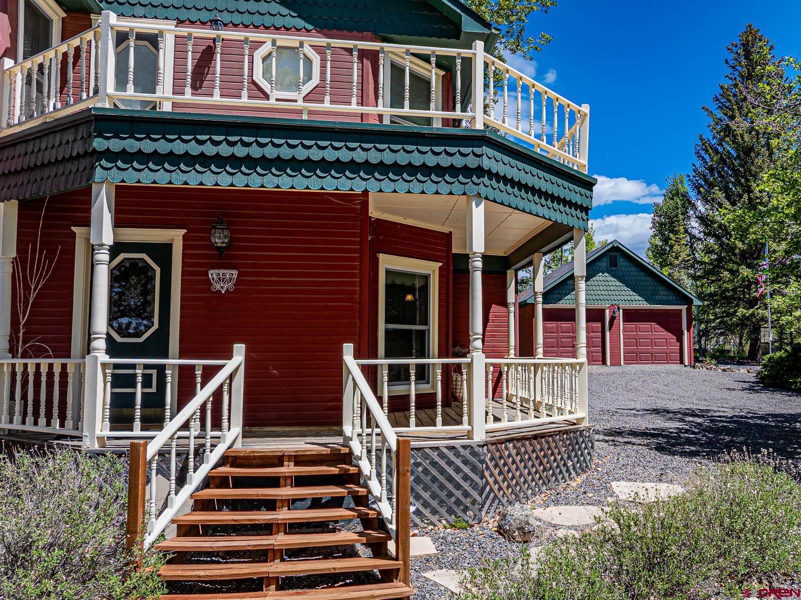 16331 2550th Road Cedaredge, CO 81413 - Photo 9 of 45 a front view of a house with wooden stairs