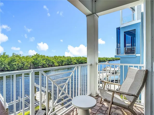 a view of a chairs and table in the patio