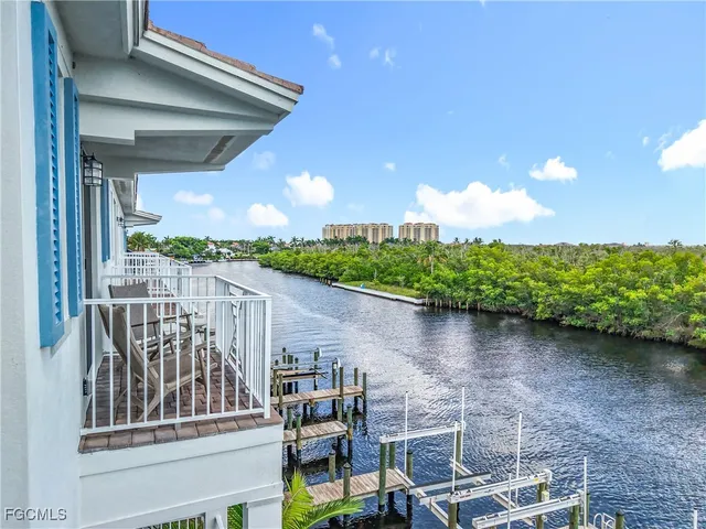 a view of a balcony with lake view
