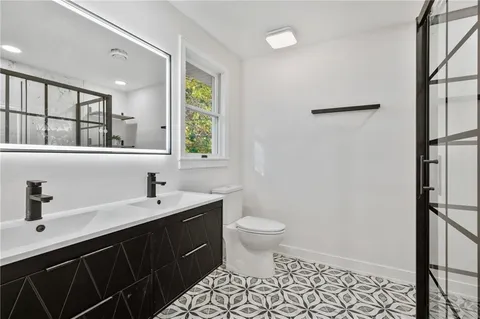 a bathroom with a sink and a toilet