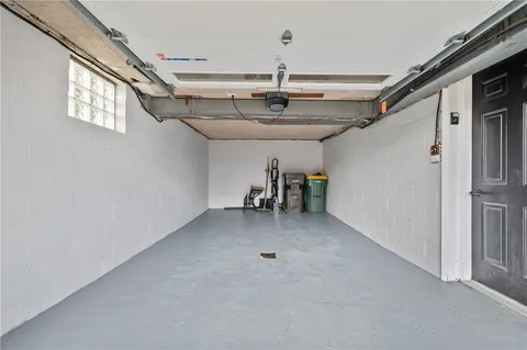 a view of balcony with wooden floor and seating space