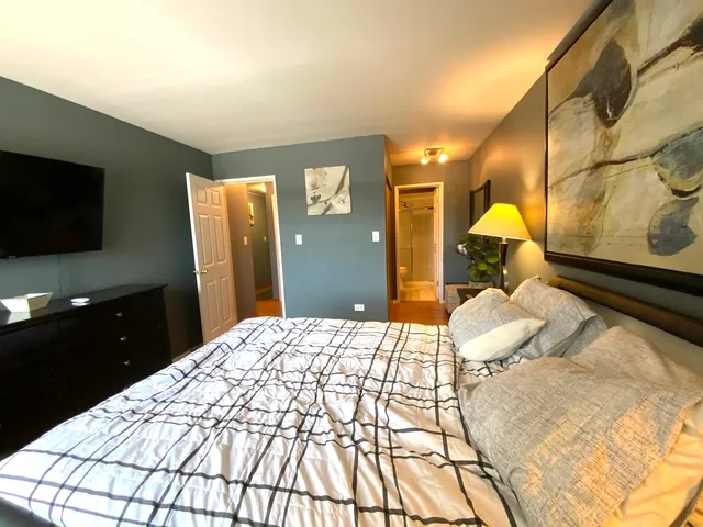 a view of a hallway with a large window