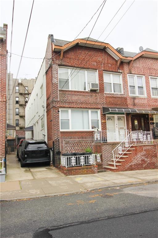 920 79th Street Brooklyn, NY 11228 - Photo 3 of 3 a front view of a house