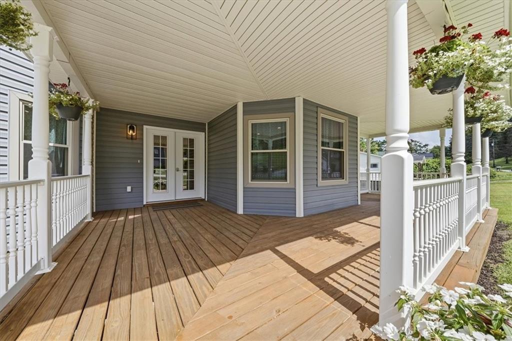 217 Country Club Road Washington, PA 15301 - Photo 2 of 50 365-square-foot covered front porch on a historic Victorian estate near Pittsburgh, PA — built for morning coffee and country views
