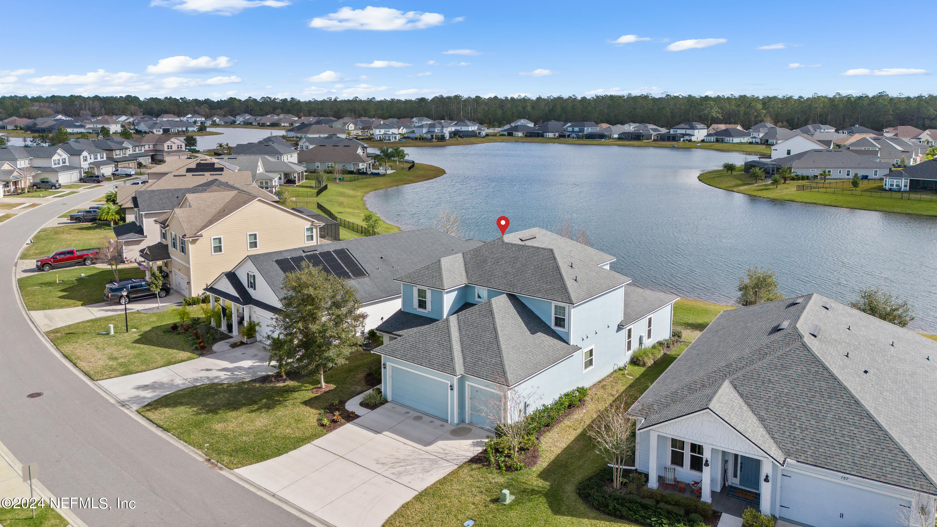 143 Willow Lake Drive St. Augustine, FL 32092 - Photo 1 of 45 an aerial view of a house with outdoor space lake view and boat