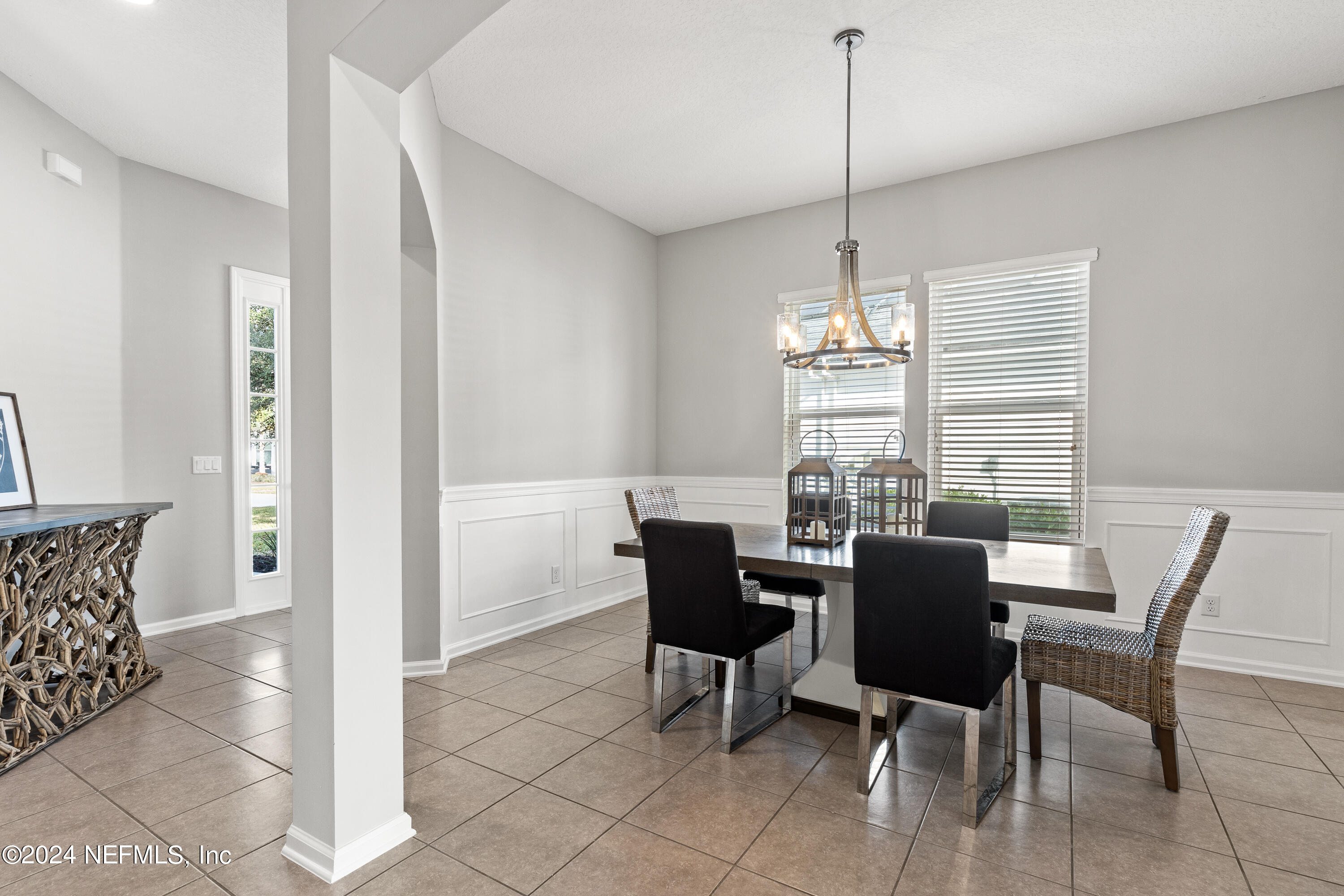 143 Willow Lake Drive St. Augustine, FL 32092 - Photo 2 of 45 a dining room with furniture and window