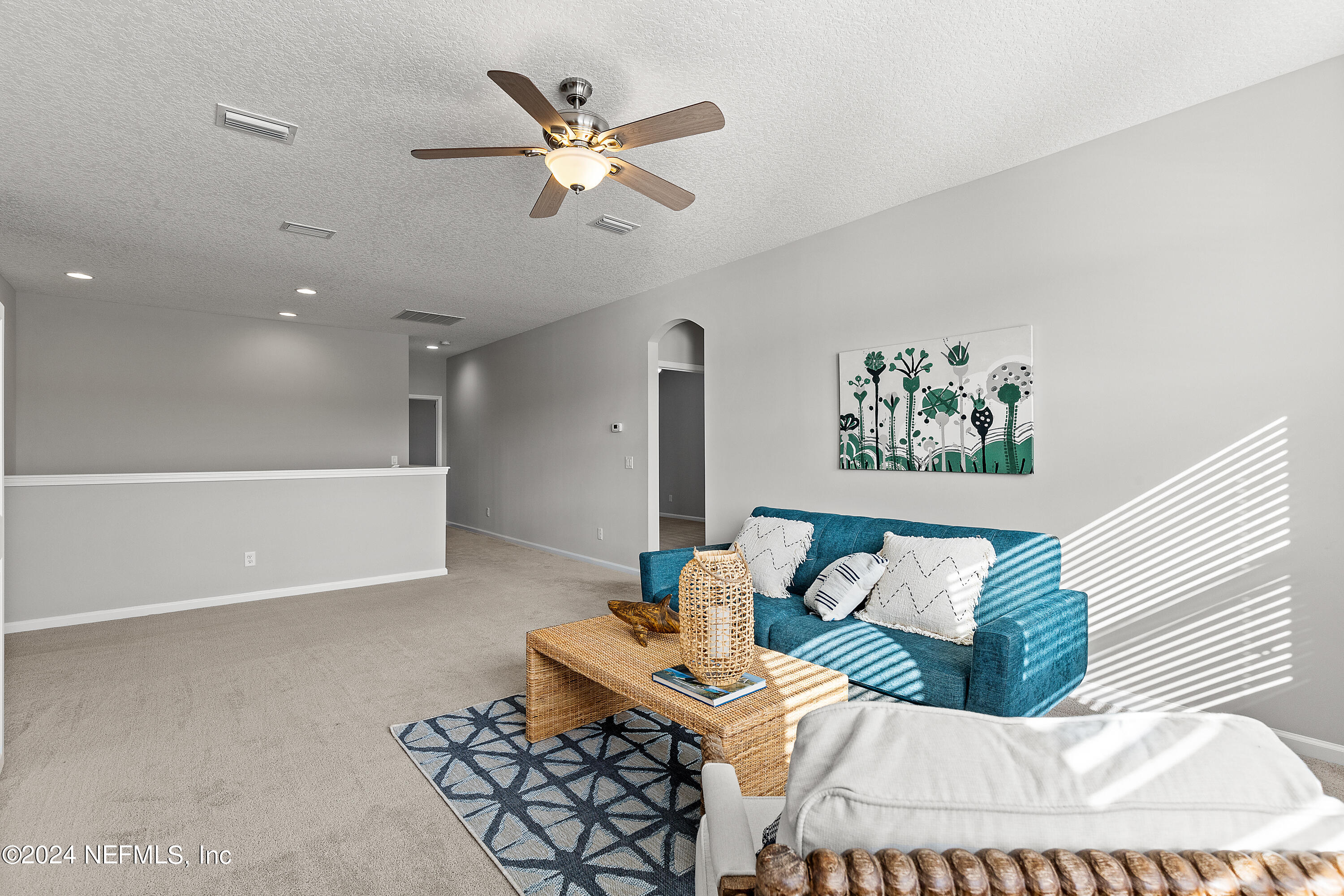 143 Willow Lake Drive St. Augustine, FL 32092 - Photo 22 of 45 a living room with furniture and a wooden floor
