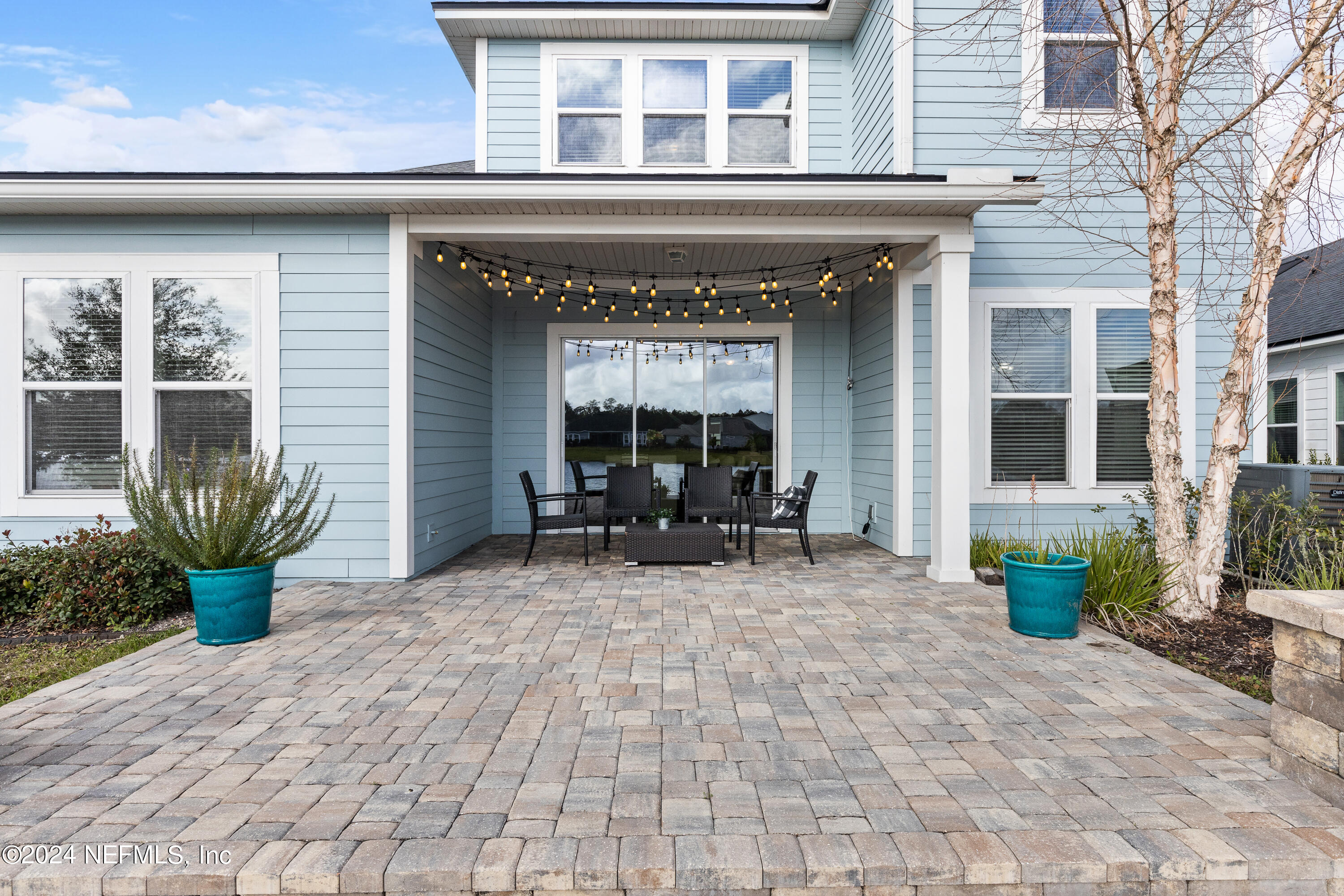 143 Willow Lake Drive St. Augustine, FL 32092 - Photo 32 of 45 a view of living room with furniture and potted plants