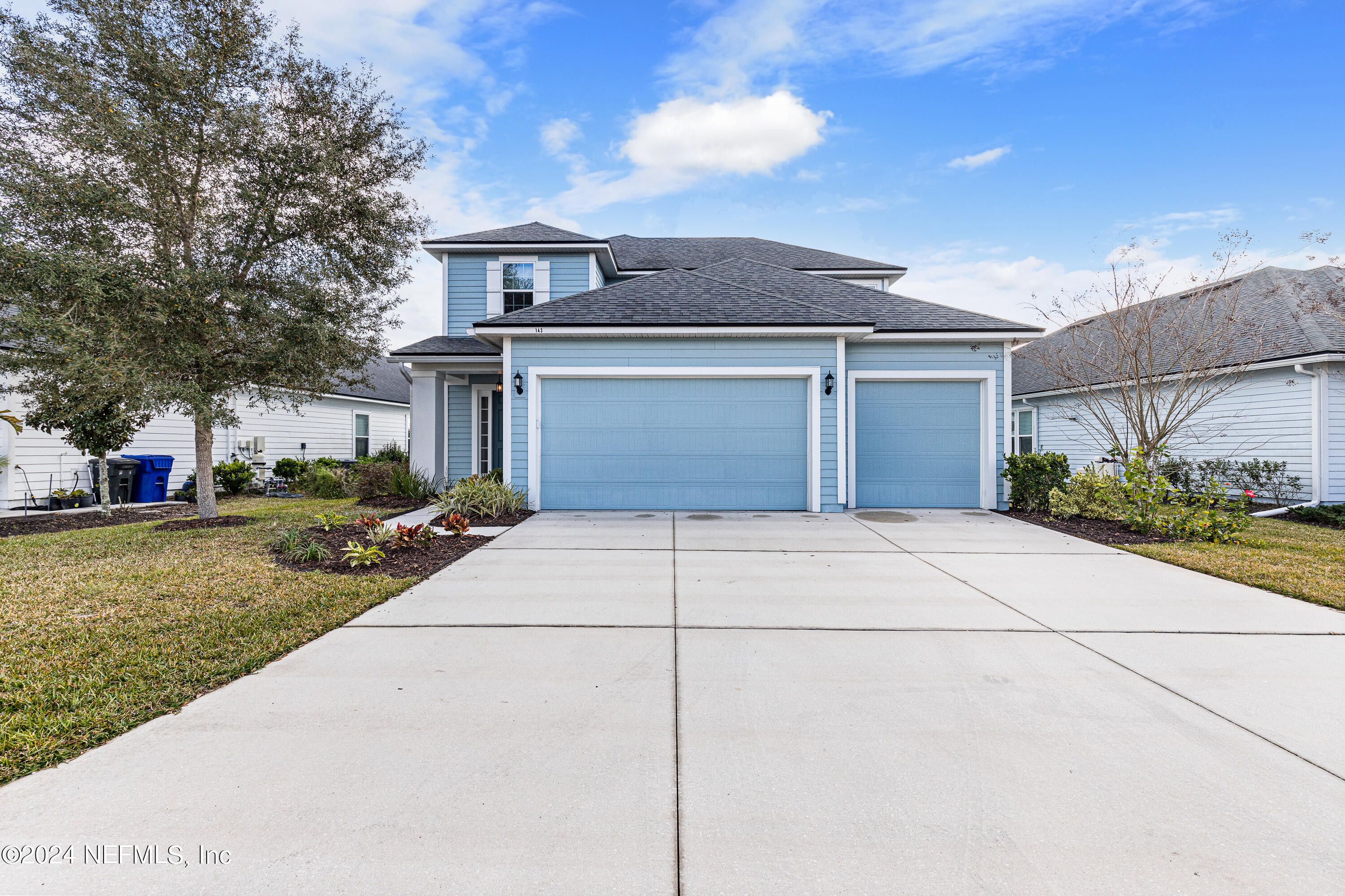 143 Willow Lake Drive St. Augustine, FL 32092 - Photo 35 of 45 front view of a house with a yard
