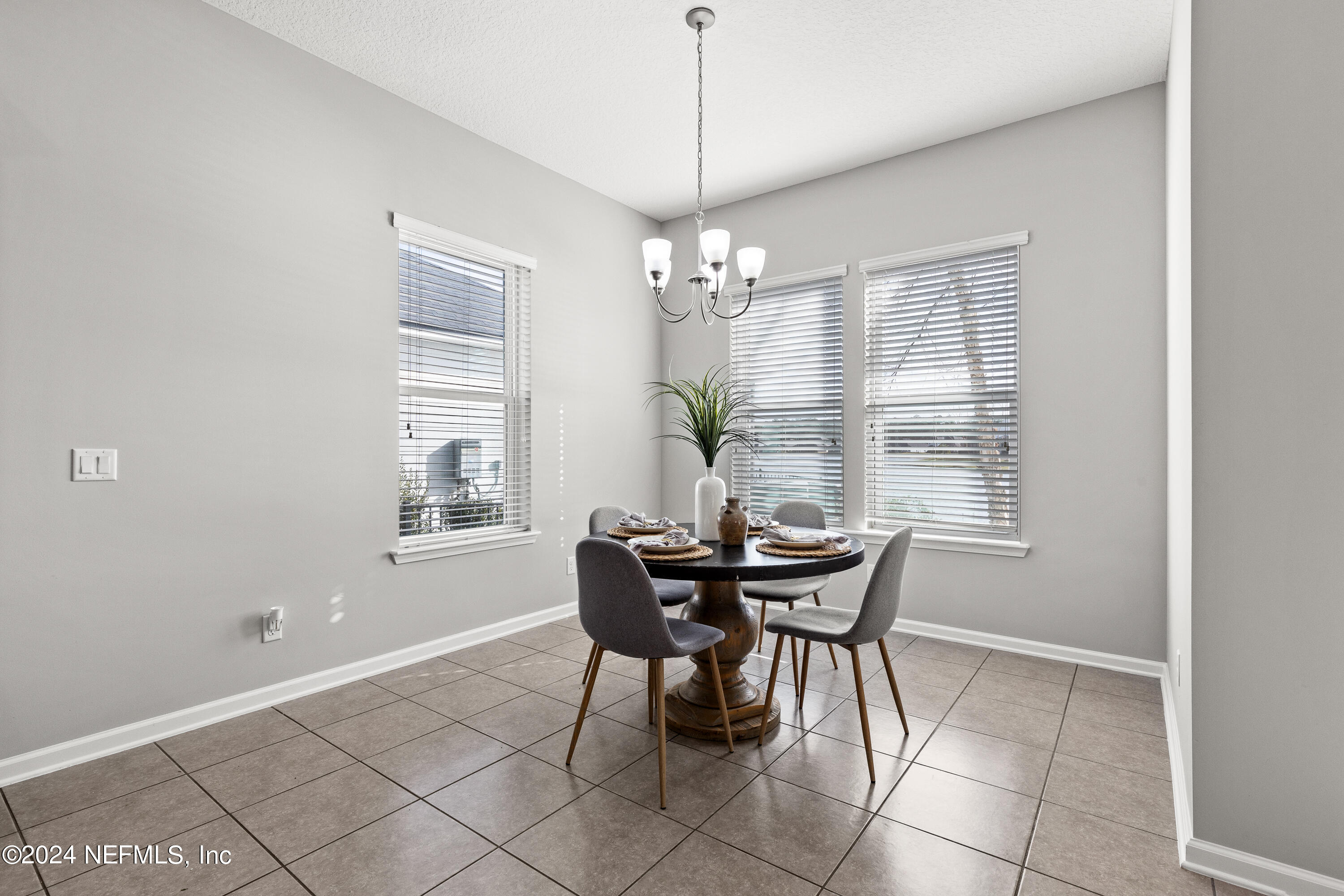 143 Willow Lake Drive St. Augustine, FL 32092 - Photo 9 of 45 a dining room with furniture and window