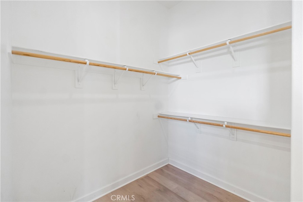 199 Follyhatch Irvine, CA 92618 - Photo 32 of 32 a view of a room with racks on the wall