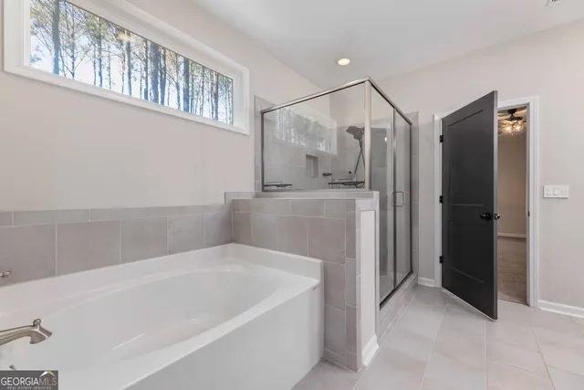 a view of a hallway with windows