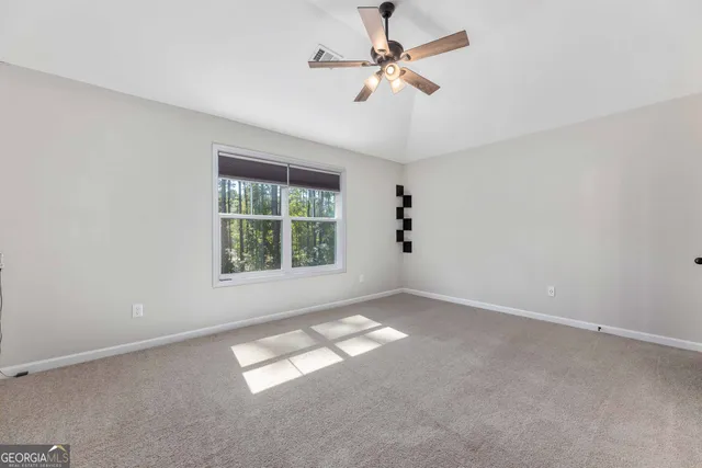 a view of a living room and outdoor space