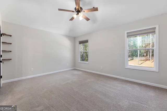 a view of swimming pool with yard