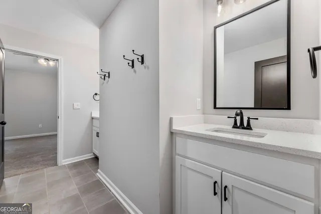 a view of a patio with a garden