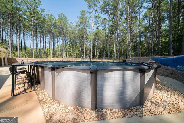 a picture of a bathroom with a shower