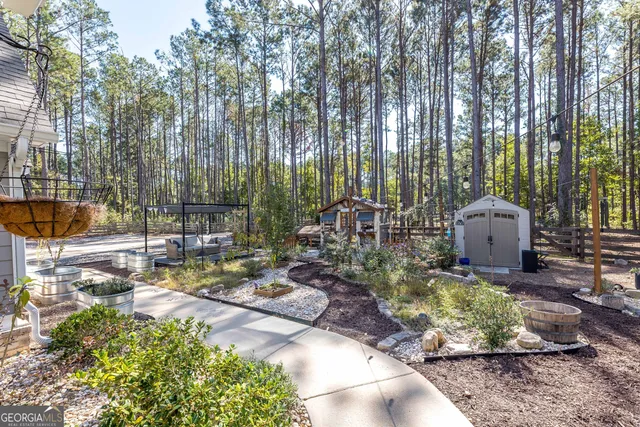 a view of a porch with chairs and backyard