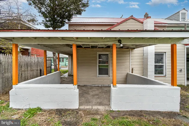 a view of house with outdoor space