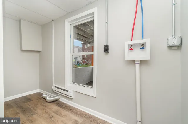 a room with a door and a window