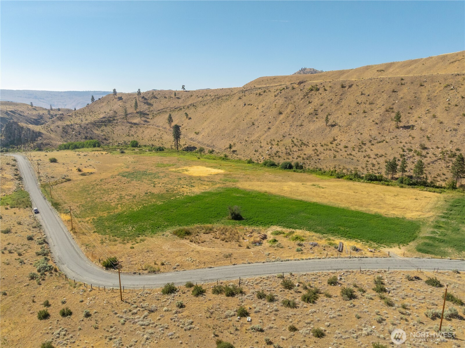 0 Antoine Creek Road Chelan, WA 98816 - Photo 3 of 18 a view of a road with an ocean